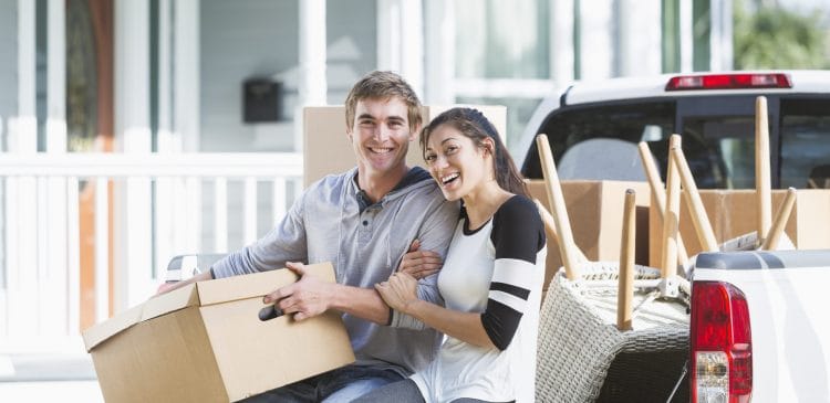 homeowners insurance policy holders smile because they know how to cut their energy costs